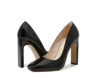 Close-up details of black patent leather square toe chunky high heels for women footwear.