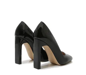 Black patent leather block heel pumps, back angle detail showing square toe and thick heel.