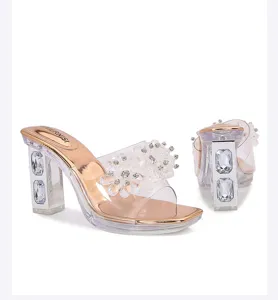 Crystal flower clear high heel sandals detail, chunky block heel with sparkling rhinestone.