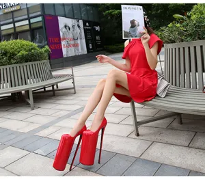 Extreme platform high heels with exaggerated long toe design, perfect for stage dancing.