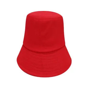 Close-up view of a classic plain red bucket hat, showing the clean cotton fabric texture.