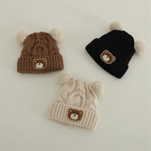 Cute baby knit winter beanie with bear patch and double pom pom ears, warm toddler hat.