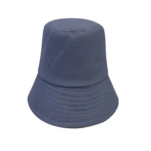 Close-up detail showing the neat stitching and soft cotton fabric of the blue hat.