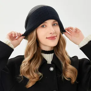 Stylish two-tone knit bucket hat for women, perfect for cozy autumn and winter warm wear