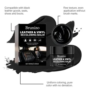 Leather recoloring balm detail showing smooth texture and even black color application.
