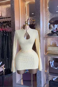 Women long sleeve cutout jacquard mini dress sweet sexy clothing boutique fashion apparel.