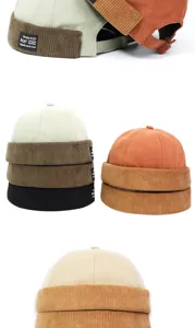 Ribfluwelen docker muts retro miki hoed detailweergave met stijlvol contrasterend stikwerk.