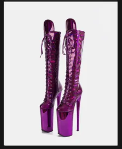Glossy purple extreme platform lace-up stiletto high heel boots for fashion runway show.