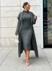 Women fuzzy knit two-piece outfit featuring a long cardigan and matching dress for winter.
