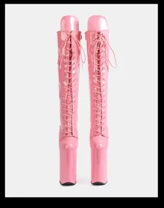 Pink patent leather platform lace-up long boots detail shot showcasing the high heel and finish.