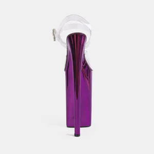 Extreme high heel platform sandals detail view, featuring metallic purple finish and clear straps.