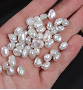 Close-up detail of irregular baroque freshwater loose pearls, strong luster DIY jewelry making.