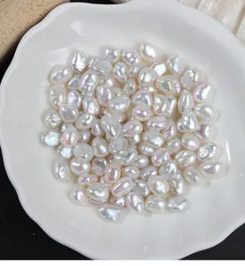 Detail shot of strong luster 6.5-7mm baroque natural freshwater irregular loose pearls for DIY.
