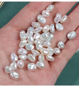 Close-up of irregular baroque freshwater loose pearls showing natural luster and unique shapes.