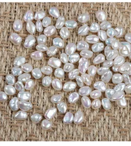 Close-up view of irregular baroque freshwater pearls, perfect for DIY jewelry making and earrings.