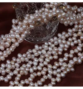 Detail shot of natural freshwater pearl rice beads semi-finished strands for DIY jewelry making.