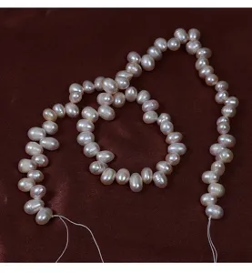 Natural freshwater baroque pearl strand beads for DIY jewelry making and crafting supply.