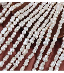 Natürliche Süßwasser Barock Perlen Strang unregelmäßige Form Schmuck Detail Ansicht.
