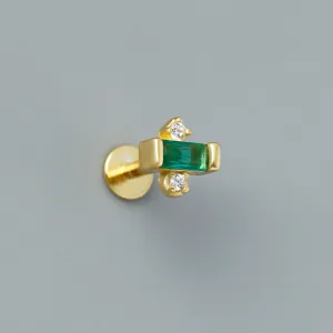 Close-up detail of S925 sterling silver flat back labret stud with green rectangular zircon