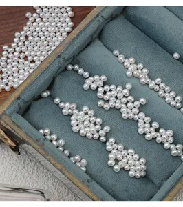 Nahaufnahme von 3-3.5mm ungelochten echten Süßwasserperlen lose Mini Perlen für DIY Schmuck und Inlegwerk.