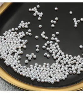 Detailaufnahme von 3-3.5mm natürlichen Süßwasser Perlen, lochlos, ideal für DIY Schmuck Basteln.
