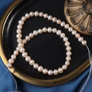 Filo di perle d'acqua dolce naturali, perle bianche lisce a forma di uovo da 7mm per creazione.