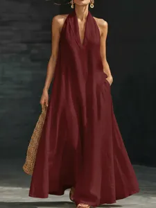 Vista dettagliata dell'elegante abito lungo bordeaux con scollo a V, ideale per l'estate.