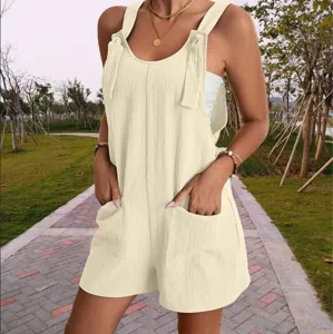 Casual summer women strap romper shorts detail view, showing soft fabric, pockets and cute straps.