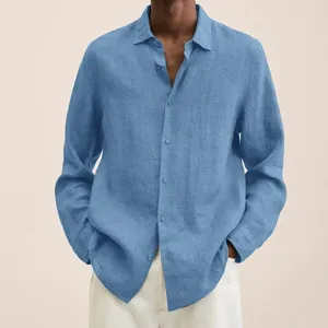 Close-up view of the blue long-sleeve linen button-up shirt showing fabric texture.