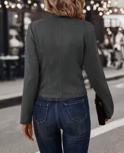 Solid color faux suede jacket detail view, vintage long sleeve outerwear for women street style.