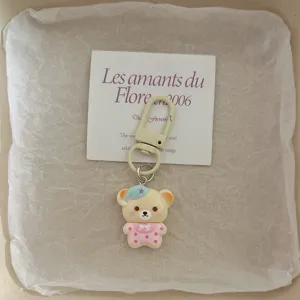 Joli porte-clés pendentif ours en pyjama de dessin animé avec carte, accessoire de sac.