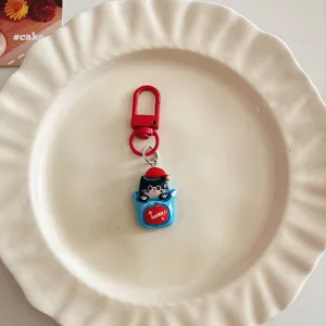 Cute cartoon black cat keychain with red hat and hook, perfect bag pendant accessory gift.