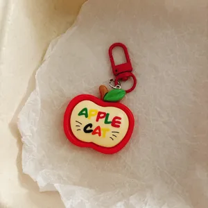 Cute apple cat keychain pendant, creative bag charm and backpack accessory gift for friends.