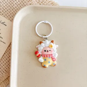 Cute cartoon sheep keychain pendant detail view, adorable animal keyring accessory for backpack bags.