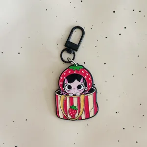 Cute strawberry girl acrylic keychain pendant detail view, perfect bag accessory and charm.