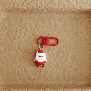 Cute Christmas Santa keychain pendant, festive bag charm ornament, perfect holiday gift.