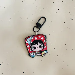 Cute big-eyed girl acrylic keychain pendant, stylish bag charm and sweet gift accessory.