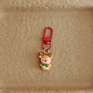 Cute cartoon reindeer keychain bag charm detail view for wonderful Christmas gift.