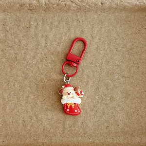 Cute Christmas cartoon keychain bag charm holiday gift pendant for students and women.