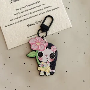 Schattig cartoon meisje acryl sleutelhanger detail, charmante tas hangend accessoire.