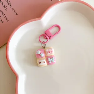 Cute four-grid bread cat and pig keychain pendant, sweet pink bag hanging accessory gift.
