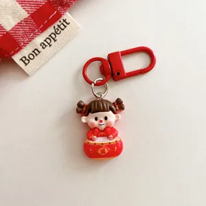 Cute red cartoon fuwa keychain bag charm for new year gift, metal clasp ornament accessory.