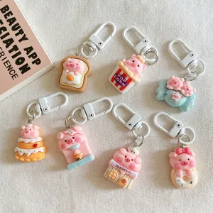 Cute cartoon pig keychain set featuring various sweet styles for backpacks and wonderful gifts.