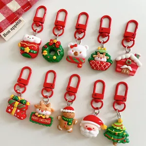 Cute Christmas cartoon keychain set, lovely Santa Claus bag pendant holiday gift accessory.