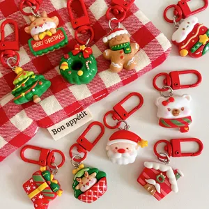 Cute cartoon Christmas keychain bag charm set, resin holiday gifts for friends and kids.