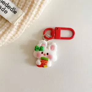 Weihnachtskarte Cartoon weiße Kaninchen Schlüsselanhänger Detailansicht, süße Tasche.