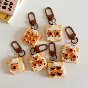 Joli porte-clés toast capybara en résine pendentif dessin animé accessoire de sac à dos.