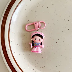 Cute ethnic style girl keychain cartoon bag charm pendant backpack accessory gift item.