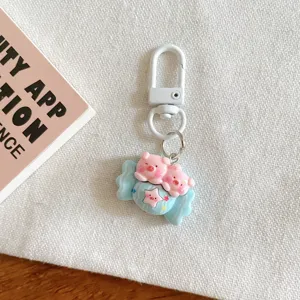 Cute cartoon pig keychain detail, sweet candy design bag charm for student gift and daily decoration.