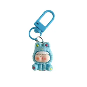 Porte-clés personnage de dessin animé poupée grosse mignonne capuche grenouille bleue sac